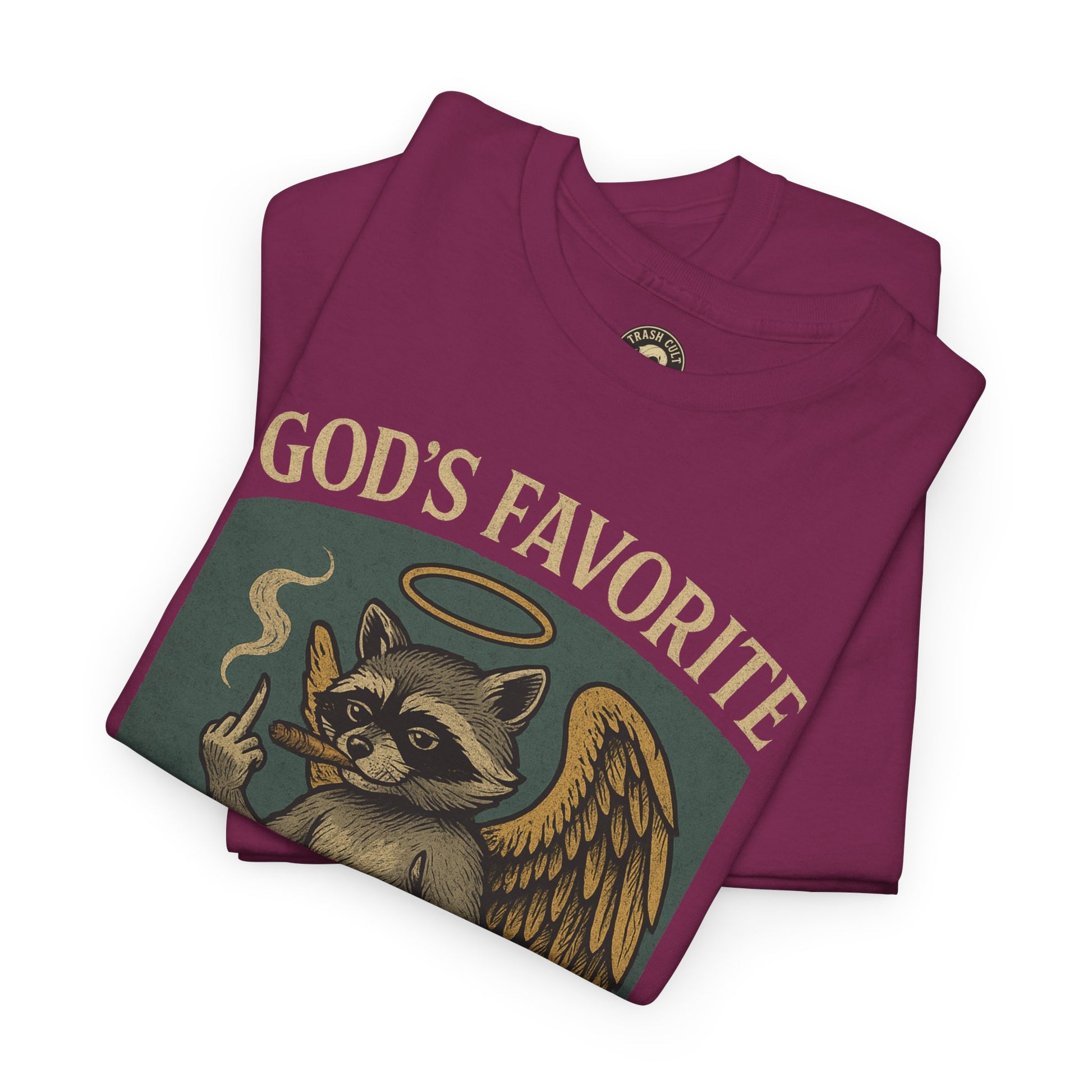 God’s Favorite Mistake Shirt – Raccoon Angel Flipping the Bird by Trash Cult Supply Co.